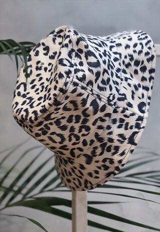 IVORY AND NAVY LEOPARD PRINT BUCKET HAT