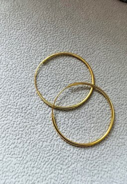 Endless Sterling silver ear hoops medium size 30mm in gold