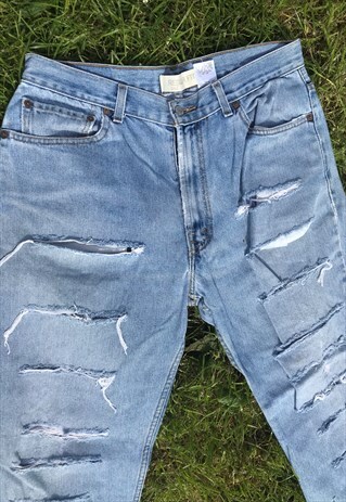 VINTAGE 90'S HIGH WAIST SHREDDED LEVI MOM JEANS
