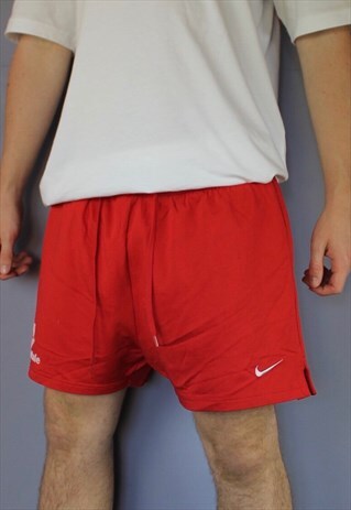 VINTAGE NIKE SHORTS IN RED WITH EMBROIDERED LOGO AND DRAWSTR