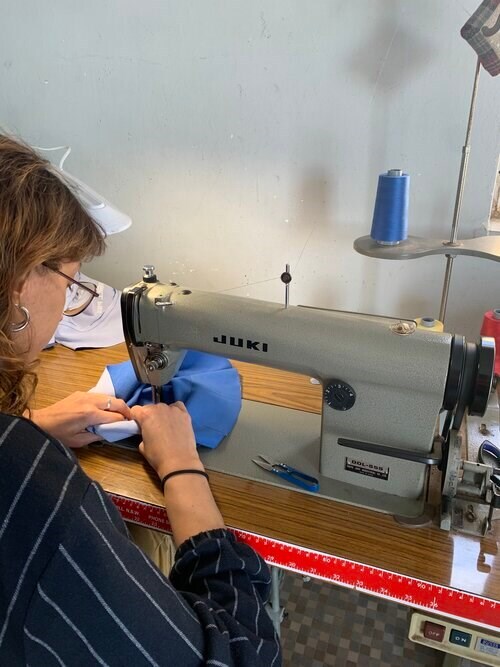 Irene working on the “CHILL PILL” bucket hat