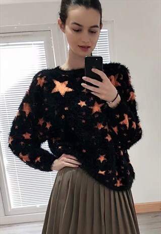 FLUFFY MULTI STARS PRINT CHRISTMAS JUMPER IN ORANGE