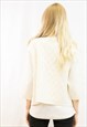KNITTED SHORT CARDIGAN WITH THREE QUARTERS SLEEVES IN WHITE 
