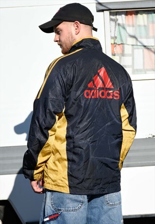 ADIDAS GOLD AND BLACK CLIMAPROOF SPORTS WEAR JACKET