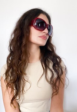Vintage Y2K oversized sunglasses in magenta pink