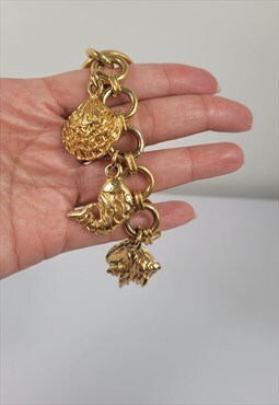 Vintage Celine Gold Tone Seashell charm bracelet
