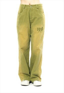 Faded jeans washed out denim numbers patch pants in green