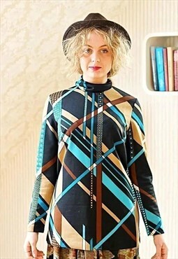 Bright striped geometric print turtleneck blouse