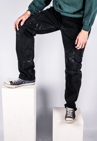 VINTAGE LEVI'S 501 JEANS IN BLACK WITH PAINT MARKS