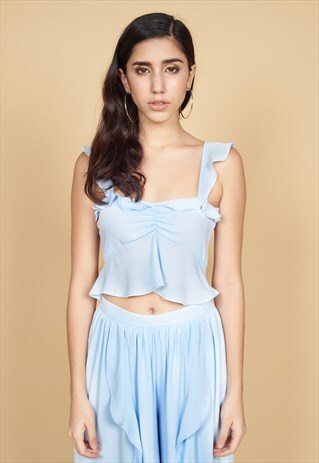 FRIDA RUFFLE TOP IN PASTEL BLUE