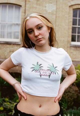 SHORT SLEEVED T-SHIRT IN WHITE WITH TROPICAL PALM TREE PRINT