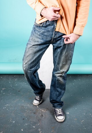VINTAGE LEVI'S 501 JEANS IN BLUE WITH RIPS