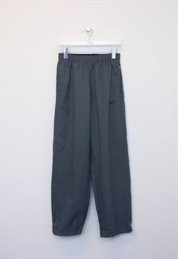 Vintage Nike track pants in grey. Best fits S