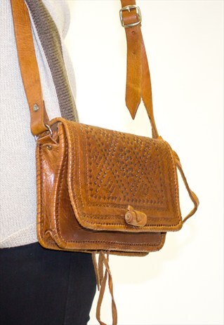 RARE WOODSTOCK LEATHER TOOLED SADDLE BAG
