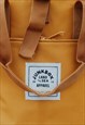 'THE EVERYDAY' RECYCLED ROLL-TOP BACKPACK IN MUSTARD