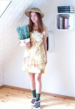 Yellow and brown sleeveless floral dress