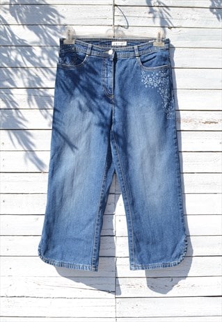 Vintage blue stretch denim jeans with floral detail