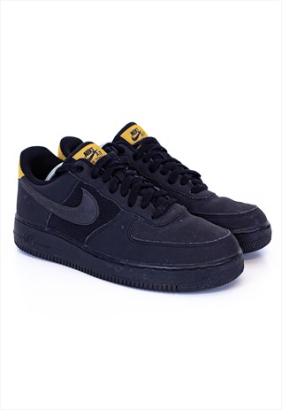 black and gold nike trainers