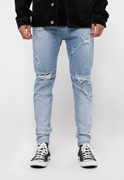 blue destroyed carrot fit jeans