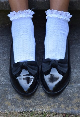 VINTAGE BLACK PATENT BOW SHOES