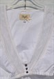 VINTAGE COTTON SHORT SLEEVED CROP TOP WITH LACE DETAILS.