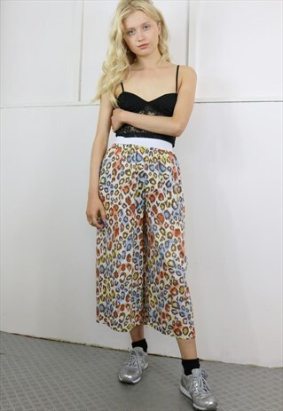 CROP TROUSERS IN ANIMAL PRINT
