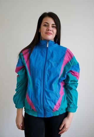 VINTAGE 90'S REEBOK SPORTS SHELLSUIT JACKET