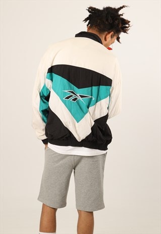 VINTAGE REEBOK WINDBREAKER FESTIVAL JACKET