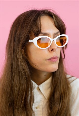 WHITE OVAL 1960'S STYLE SUNGLASSES WITH PEACH LENSES