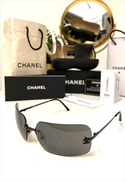 Chanel 4017 62-17 Black Rimless Sunglasses.