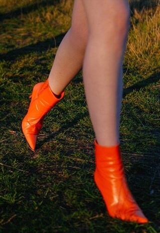 ORANGE HEELED BOOTS