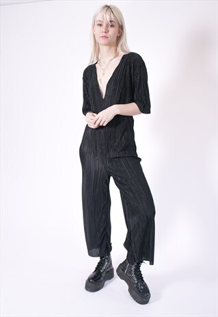WIDE LEG PLISSE JUMPSUIT WITH DEEP PLUNGE