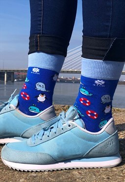 Funny colorful socks with sea animals - whale, pinguin, seal
