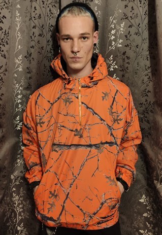 REGULAR FIT LEAVES NATURE PRINT WINDBREAKER JACKET IN ORANGE