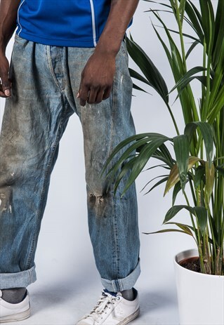 VINTAGE LEVI'S 501 JEANS IN BLUE WITH RIPS AND PAINT MARKS