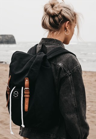 'BRAVE FREE WILD AS THE SEA' RUCKSACK BACKPACK IN BLACK