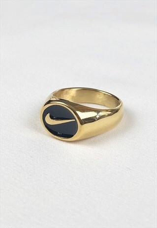 nike swoosh gold