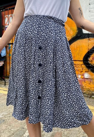 VINTAGE 70S SKIRT PLEATED IN DARK BLUE WITH WHITE FLOWERS