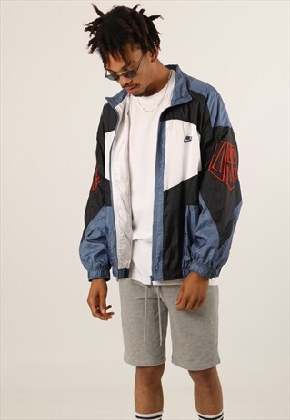VINTAGE NIKE LIGHTWEIGHT FESTIVAL SHELL JACKET