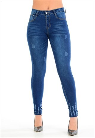 DISTRESSED SKINNY JEANS