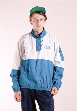 VINTAGE WINDBREAKER FROM THE 90S BY REEBOK
