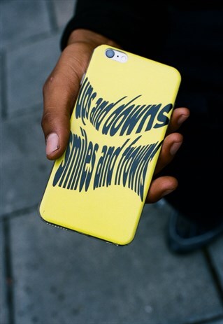 IPHONE CASE IN YELLOW WITH UPS AND DOWNS PRINT