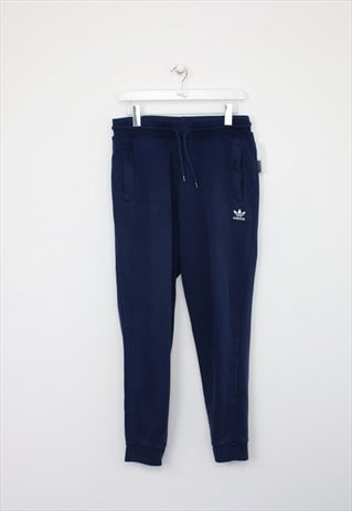 Vintage Adidas joggers in blue. Best fits M