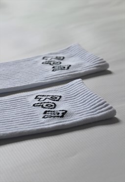 white socks with black logo