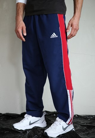 90S VINTAGE ADIDAS NAVY TRACK PANTS . UNISEX