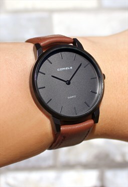 space grey watch with gold band
