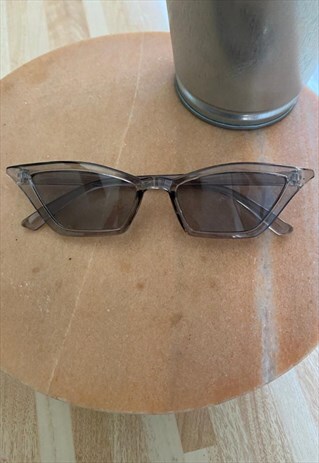 CLEAR BLACK POINTY SUNGLASSES