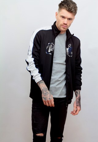 1990'S VINTAGE PUMA TRACK JACKET IN BLACK
