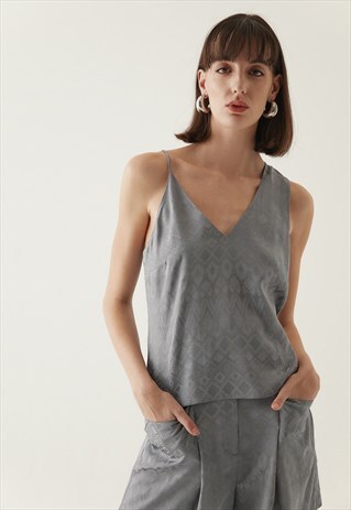 PATTERN BLOUSE WITH AN ASYMMETRIC SHOULDERS