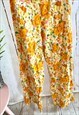 VINTAGE ORANGE FLORAL OPEN BACK 80'S JUMPSUIT